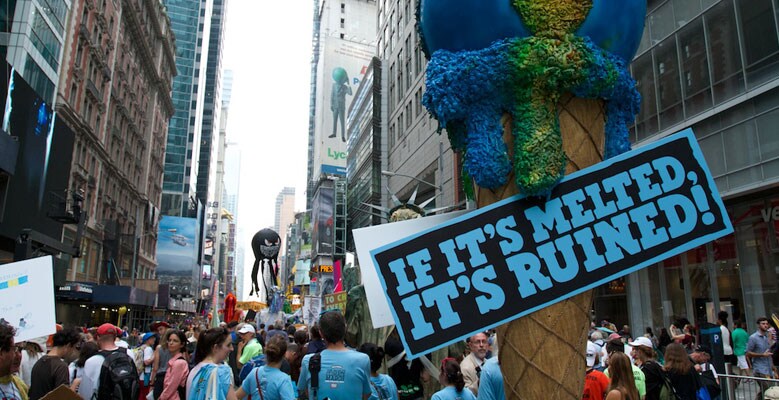 crowd of people at a climate justice parade
